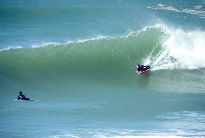 Surfer riding a right-hand wave north of Tamraght